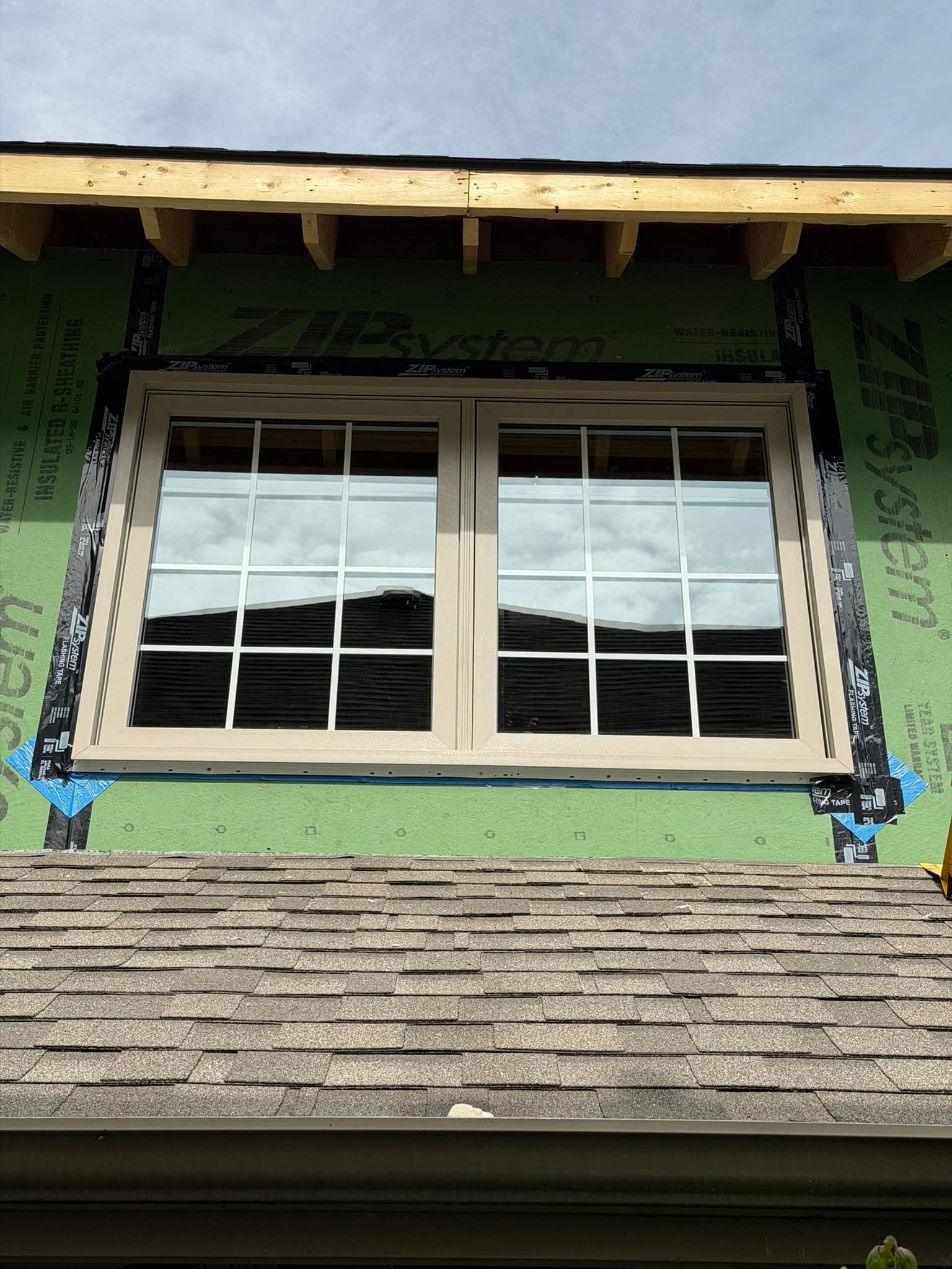 New window flashed into a dormer during a renovation